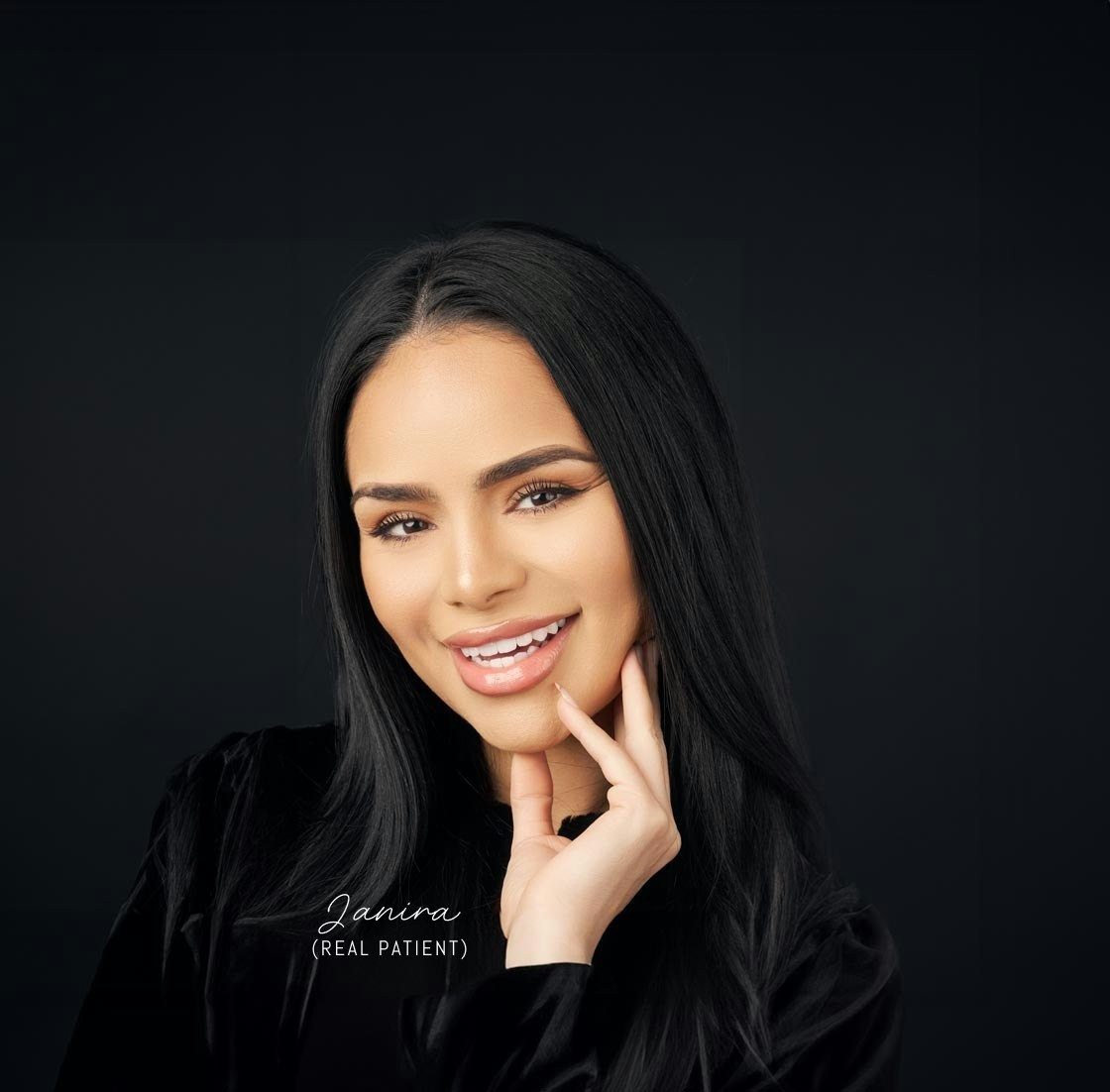 Patient smiling with porcelain veneers